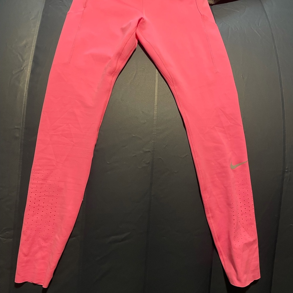 Brand new with tags. Nike dri fit athletic leggings with pockets.